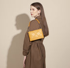Petite pochette bandoulière matelassé David Jones